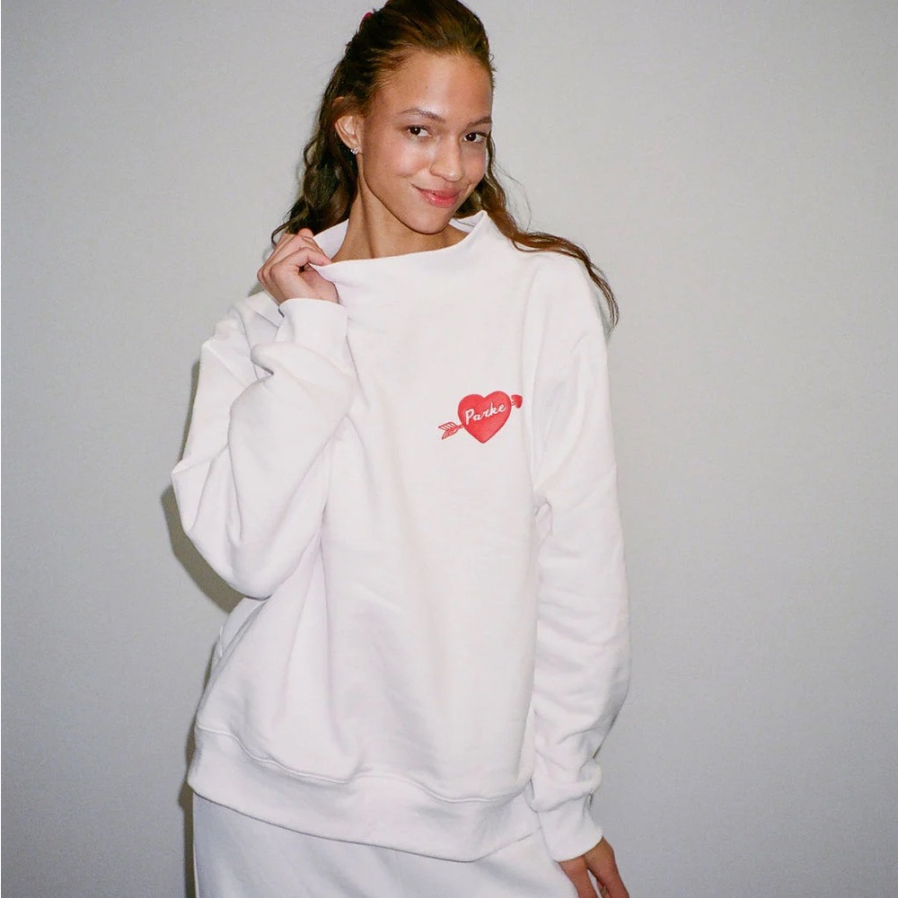Cozy White Sweatshirt with Red Heart Accent